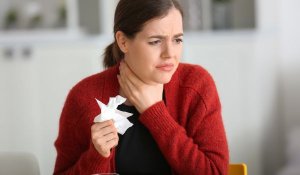 What symptoms are related to a sore throat